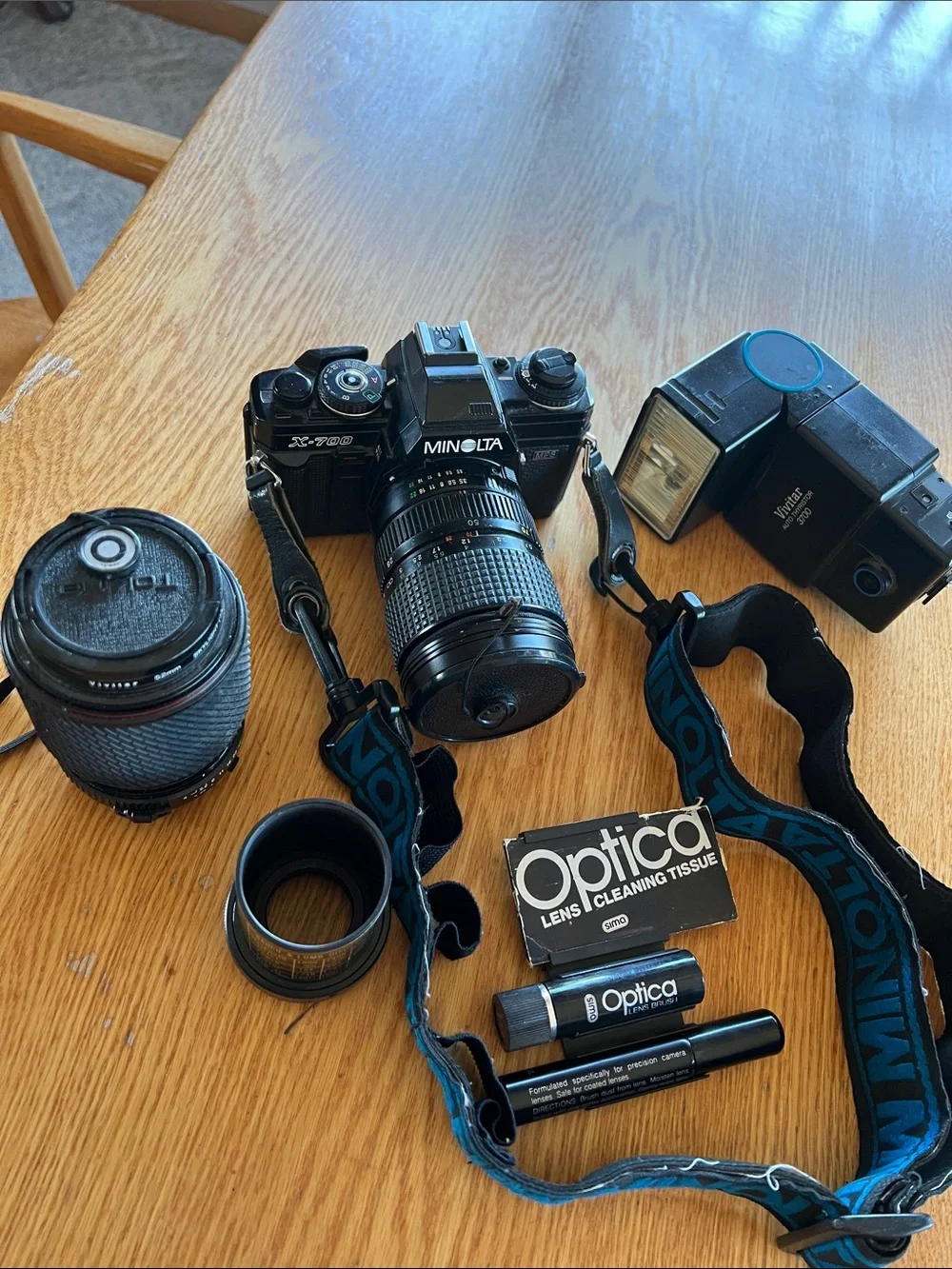 Minolta X-700 Film Camera with Black/Blue Strap, lens, adapter, auto thyristor